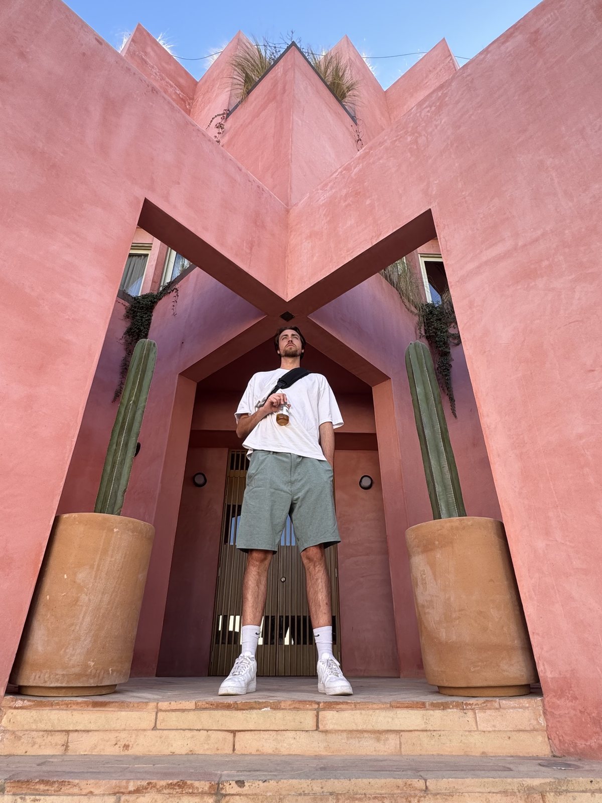 KY in front of a pink building