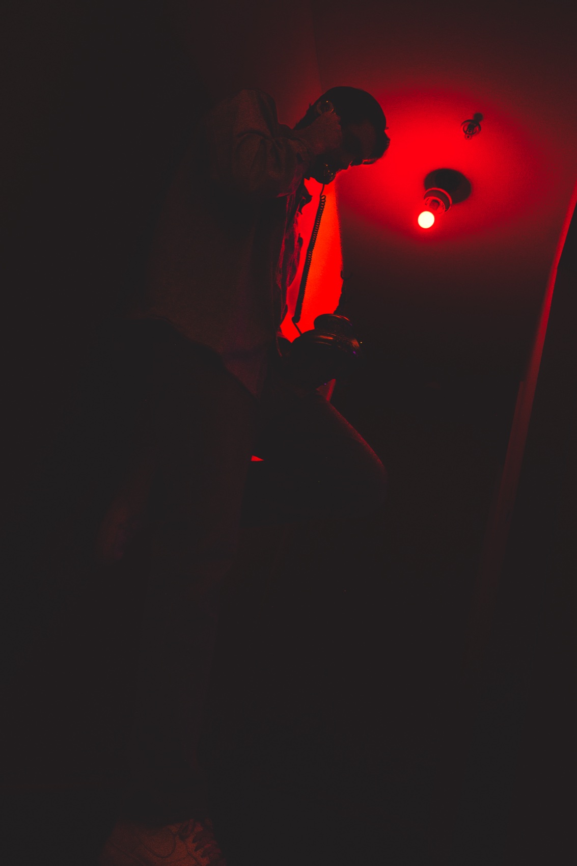 KY on the phone under a red light